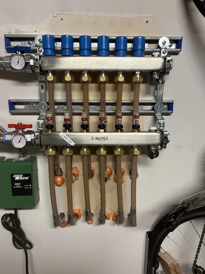 Plumber performing Water Heater Repair at a residential property in Cromwell